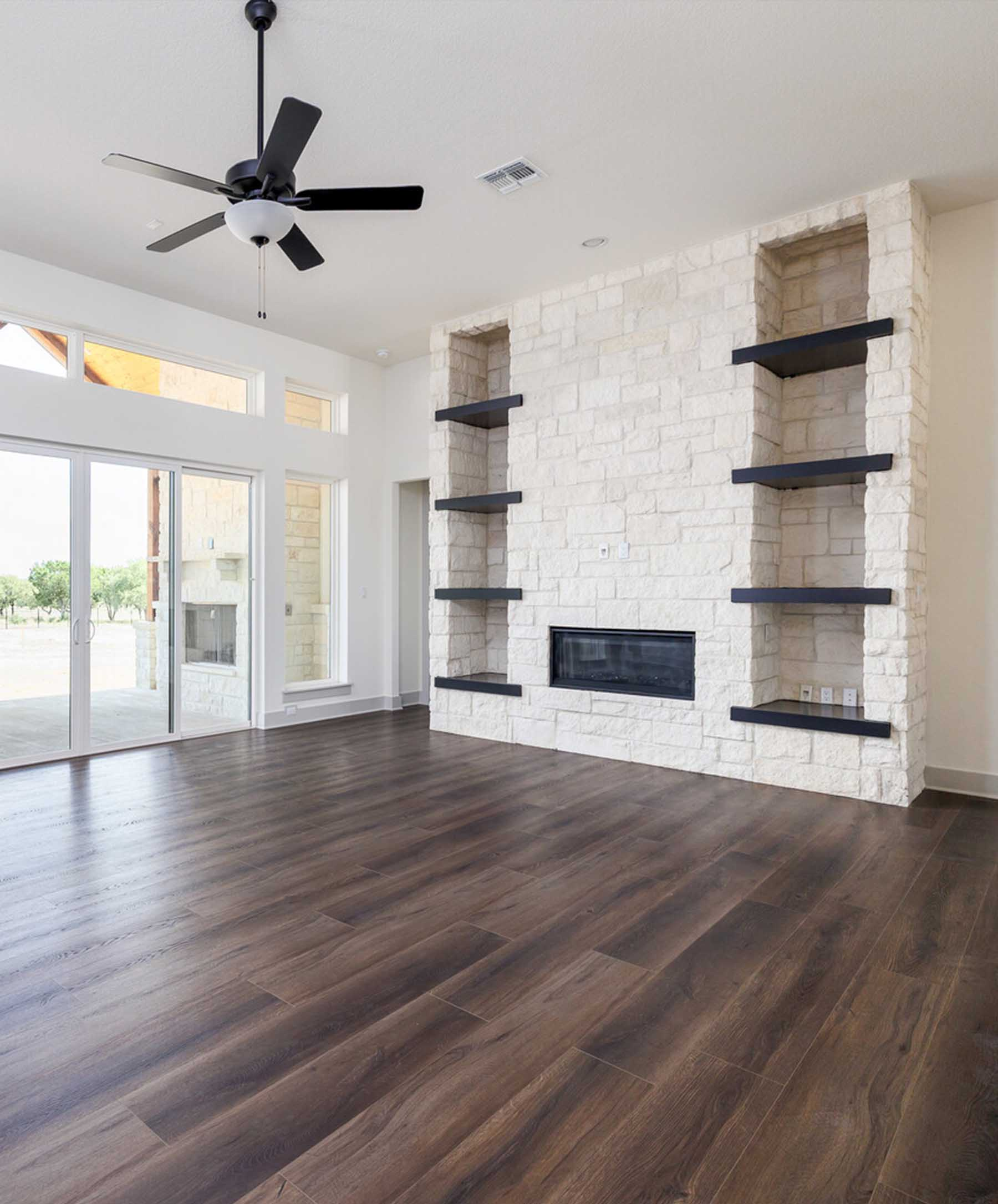 a5 Open-concept living room in custom Central Texas home